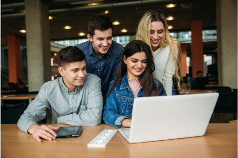 students in front of computer